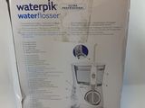 packaging for a waterpik professional water flosser