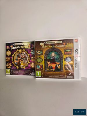 two nintendo wii games sitting on top of a white table