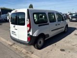 a white van that is parked in a parking lot