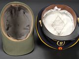 two hats sitting next to each other on a table