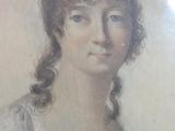 painting of a woman in a white dress in a gold frame