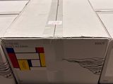several boxes are stacked on top of each other on a table