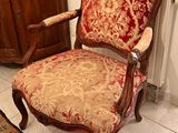 a chair that is sitting in the corner of a room