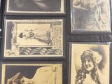 many old photos of women in a display case