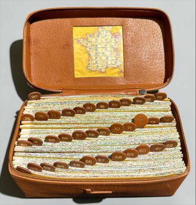 a suitcase filled with lots of different types of papers