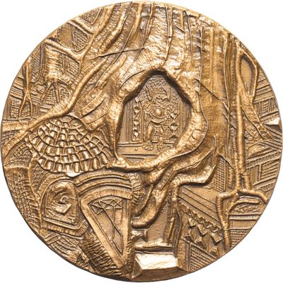 a close up of a gold coin with an image of a man on a horse
