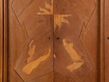 a wooden door with a carved design on it