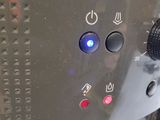 a close up of a toaster with buttons on it
