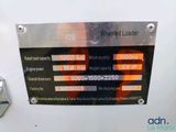 a sign on the side of a machine that says millfield loader