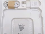 a tablet pc with a quick guide in the box