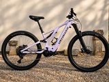 a bike that is parked in the gravel