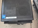 a laptop computer sitting on top of a box