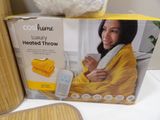 a box that has a blanket on top of it