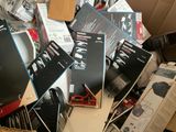 a pile of books and other items in a box