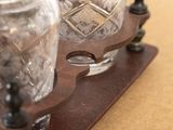 a glass jar and a glass jar on a wooden stand