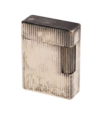 an old silver lighter with a black stripe pattern on it
