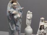 several figurines of jesus, mary, and other religious figurines are displayed on a table