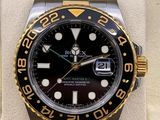une montre Rolex exposée dans un coffret