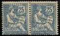 two blue and white postage stamps with a woman sitting on a bench