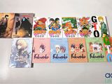 a lot of books that are on the table