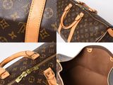 a close up of a louis vuitton handbag and a purse