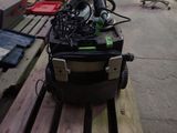 a suitcase that is sitting on a wooden bench