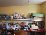 a cluttered kitchen with a lot of clutter on the counter