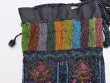 an image of a purse made out of beaded material