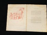 an old book with a drawing on it sitting on a table
