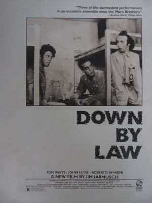 une vieille affiche de cinéma du film « Down by Law » représentant deux hommes