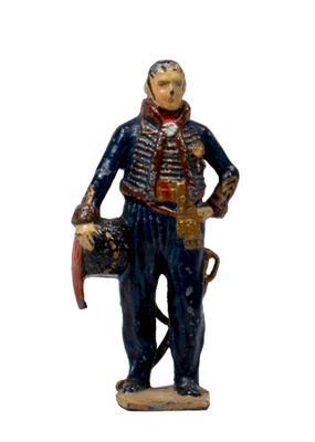 figurine of a man in uniform holding a rifle and a bag