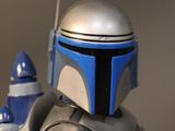 a close up of a star wars figurine of a boba fett