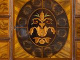 a wooden cabinet with many drawers in it