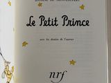 a book with a picture of a little prince on it