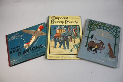 three children ' s books are lined up on a white surface