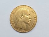 an image of a gold coin with a man ' s face on it