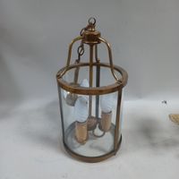 Suspension en forme de lanterne en bronze style Louis XVI .