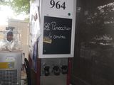 a picture of a soda dispenser in a kitchen