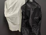 an image of two jackets on a mannequin stand