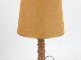 an image of a table lamp with a brown shade on it