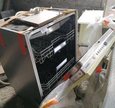 an image of a kitchen with a stove and a dishwasher