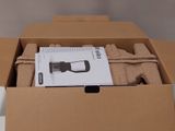 a cardboard box with a pair of shoes inside of it