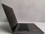 a laptop computer that is sitting on a table