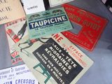 many different types of advertising signs on the table