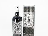 an image of a bottle of liquor sitting next to a canister