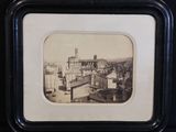 a picture of a picture of a city with a clock tower in the background