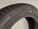 a close up of a tire on a white surface with the word tread written on it