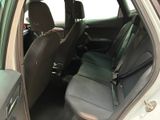 the back seats of a car with a seat belt in a car