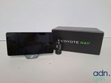 a black box with a cigarette in it sitting on a table