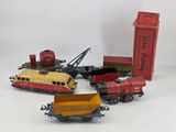 a lot of toy trains that are sitting on a table
